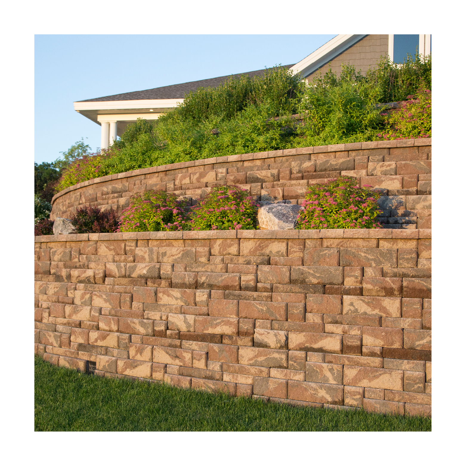 multi-level retaining wall on slope with geogrid for longevity