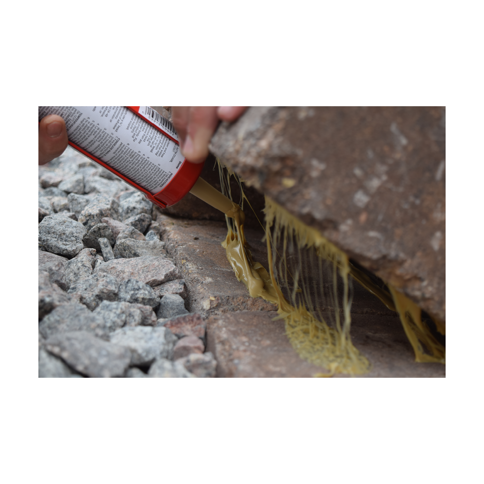 Flashing adhesive under patio block for better adhesion
